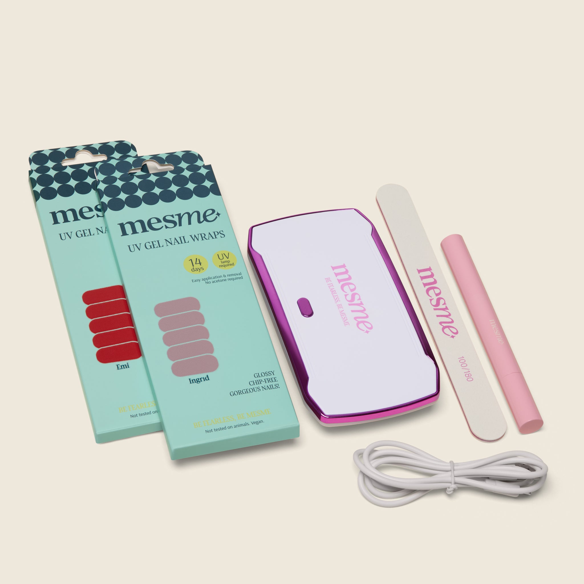 Mesme UV gel nail wrap set with packaging, lamp, and nail file on a beige background