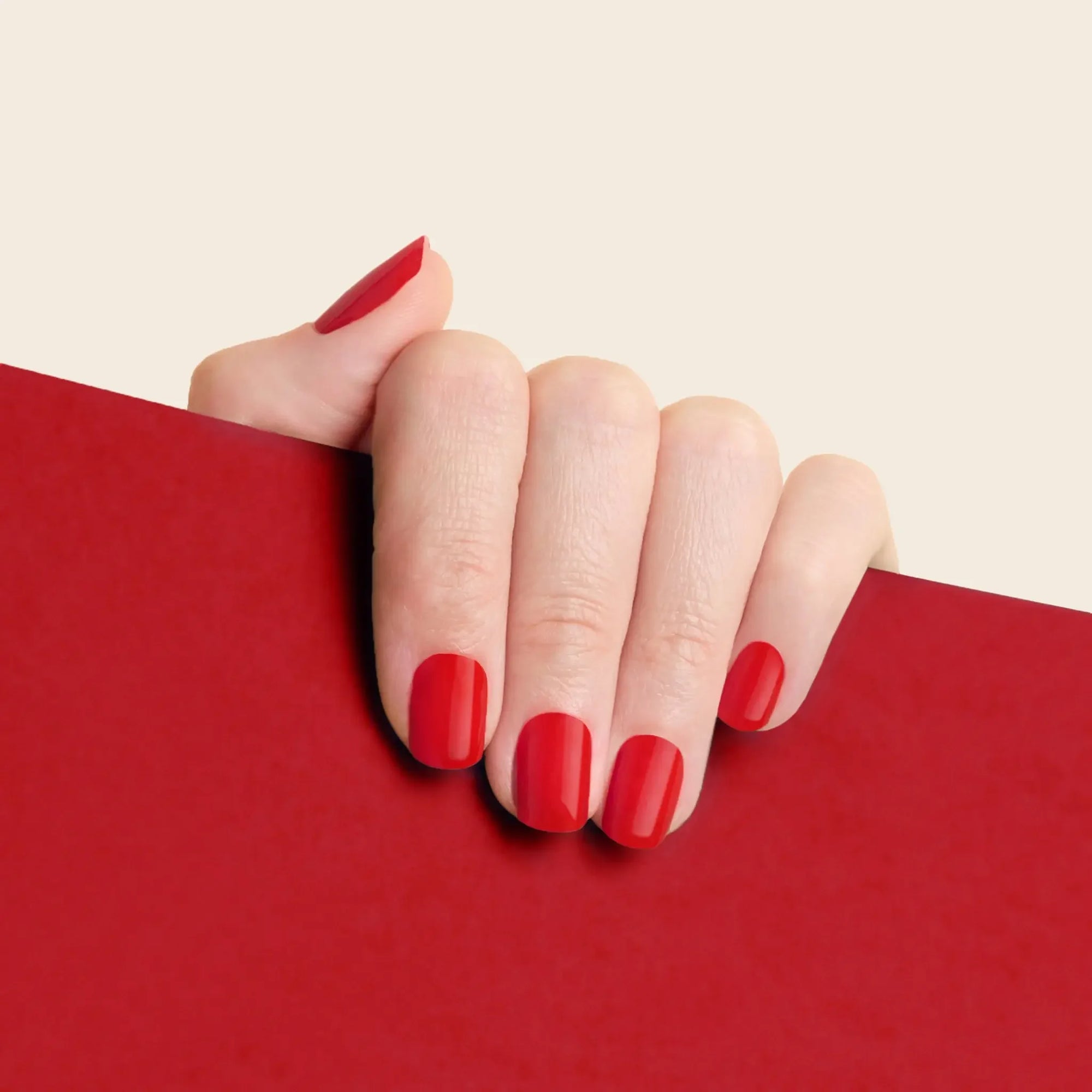 mesme Angela Classic Red 3+ Day UV-Free Gel Nail Wraps On Hand