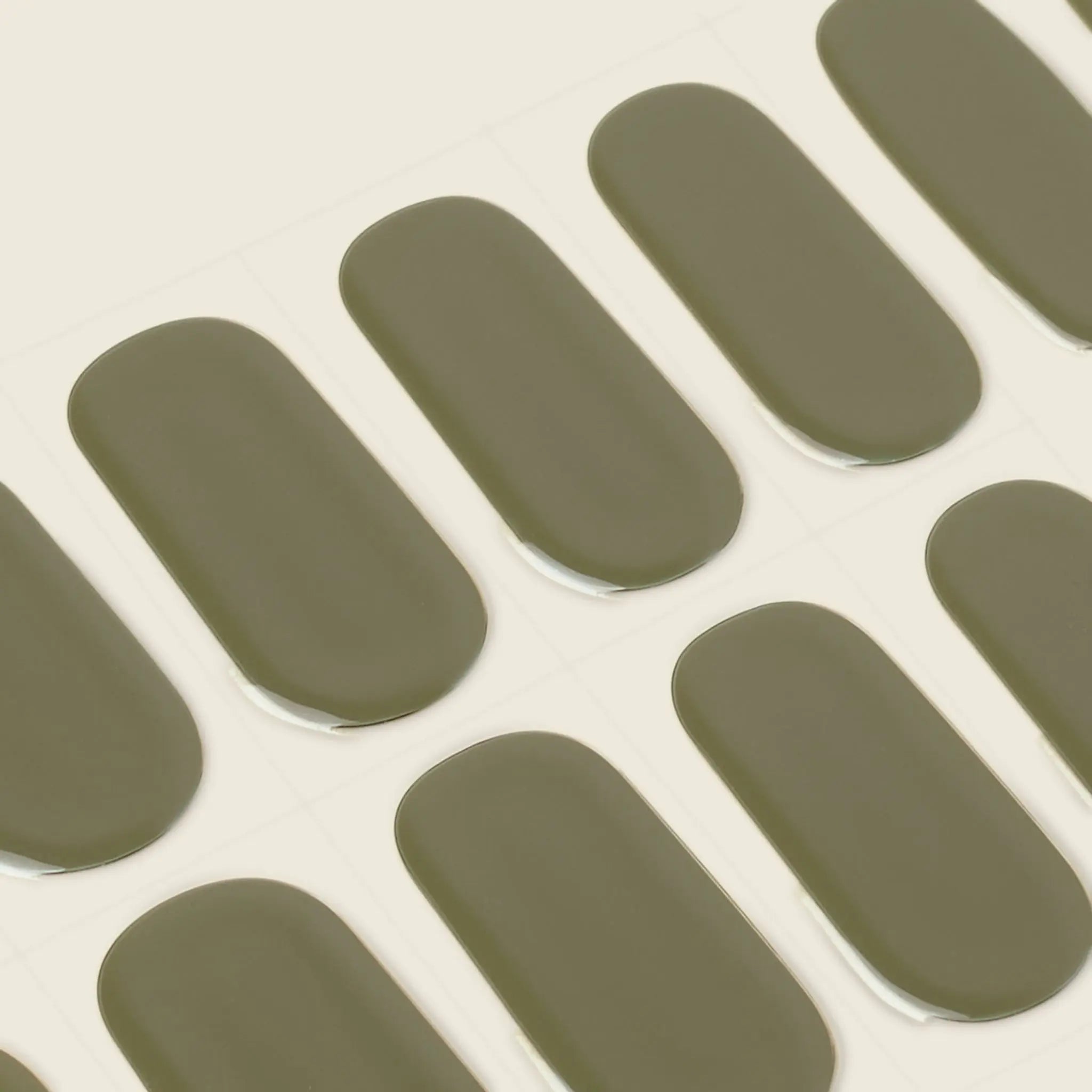 mesme Casey Olive Green 14-Day UV Gel Nail Wraps — Strip Sheet Close-Up