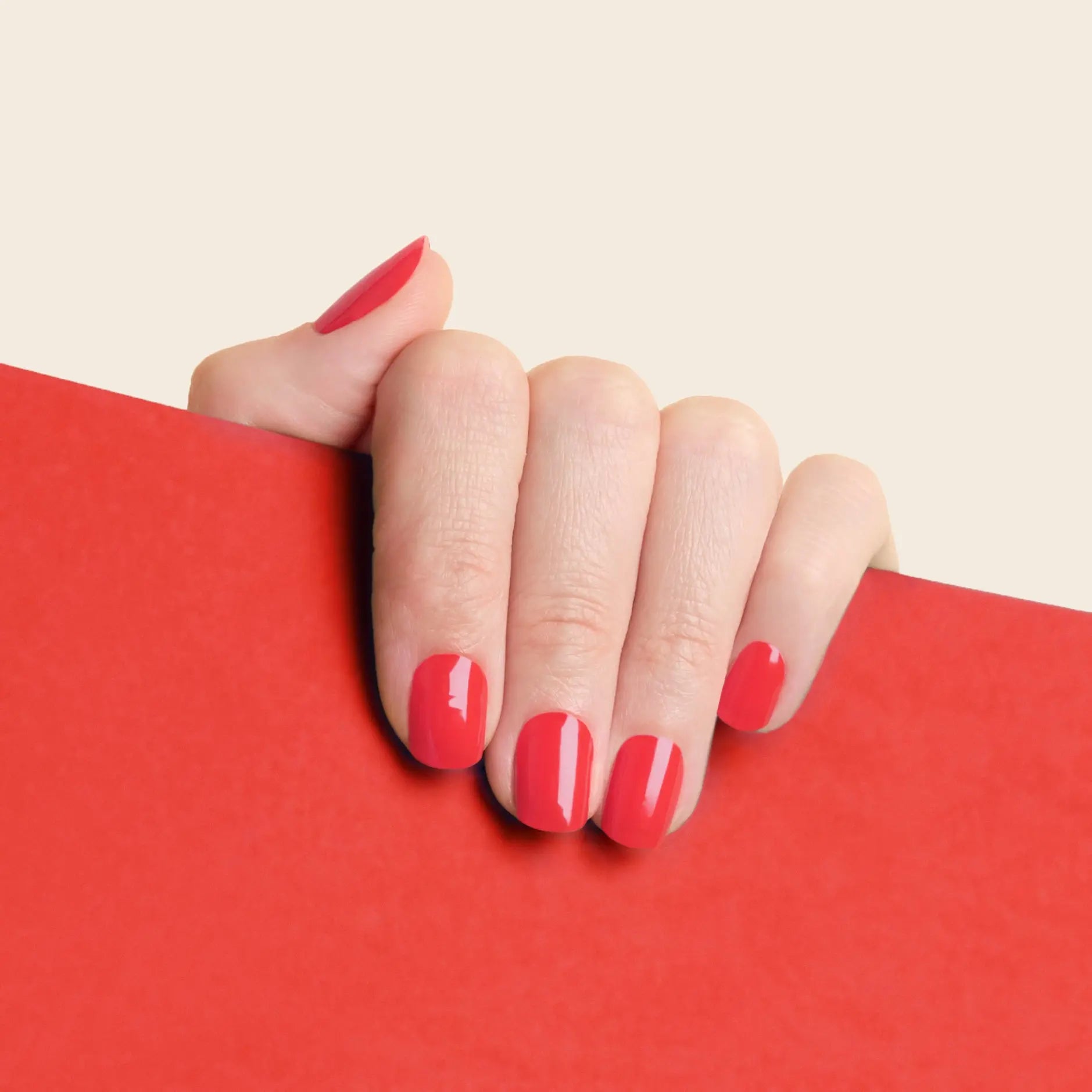 mesme Diana Red 14-Day UV Gel Nail Wraps On Hand