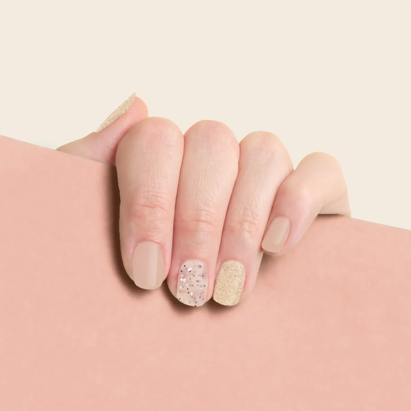 mesme Klara Nude & Glitter 3+ Day UV-Free Gel Nail Wraps On Hand