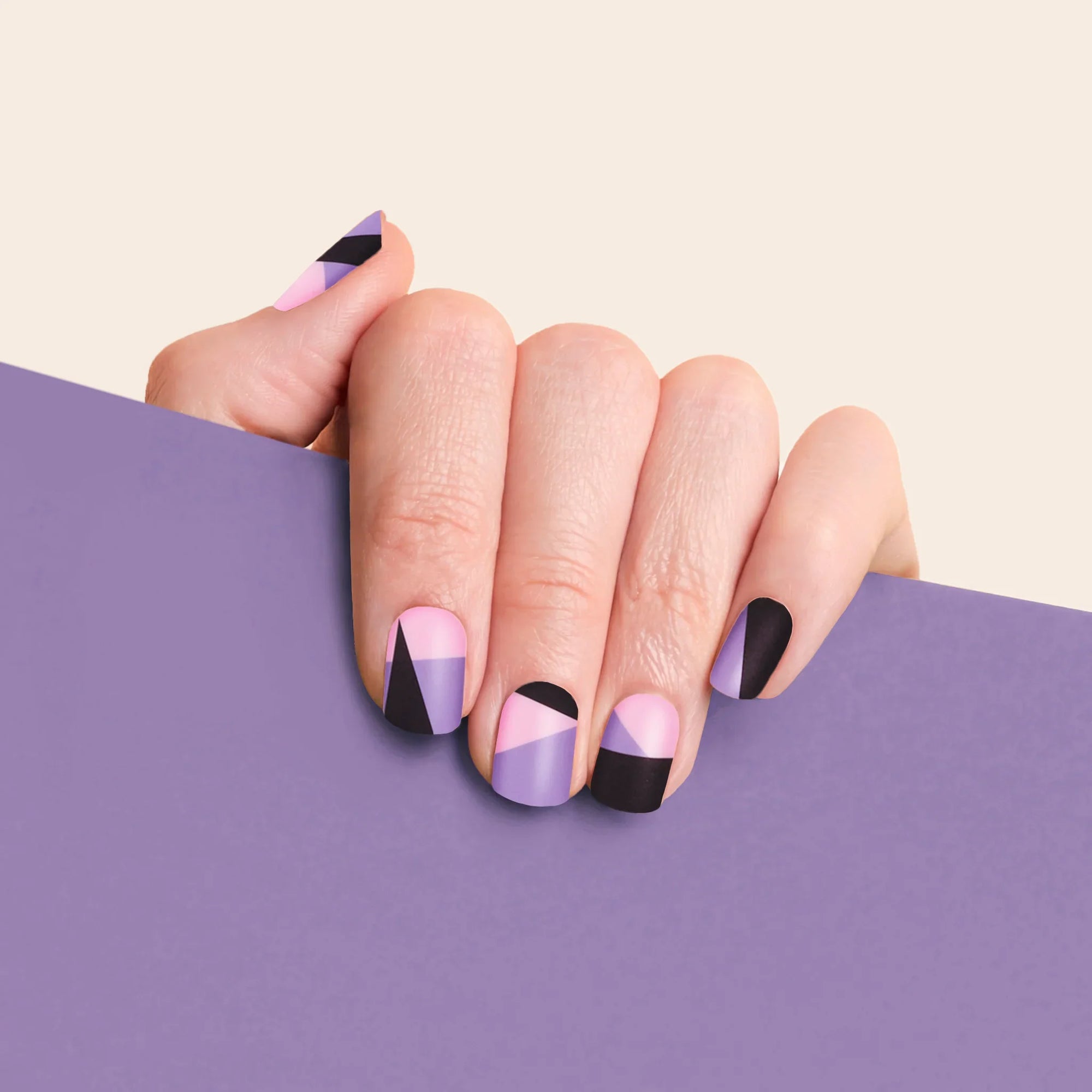 mesme Maya Lilac, Soft Pink & Jet Black 3+ Day UV-Free Gel Nail Wraps On Hand