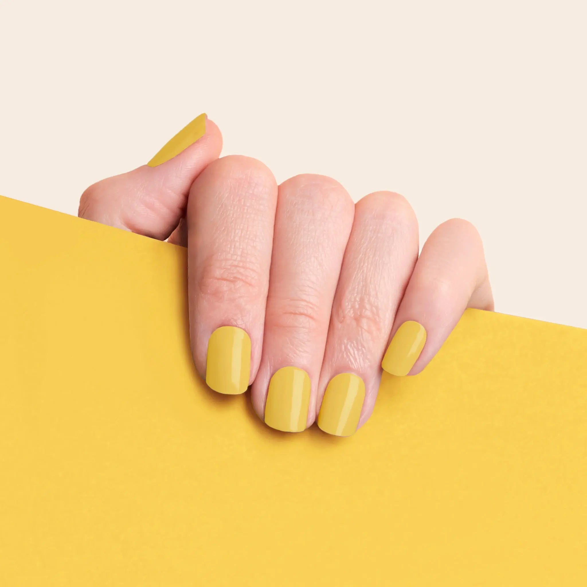 mesme Meri Mustard Yellow 14-Day UV Gel Nail Wraps On Hand
