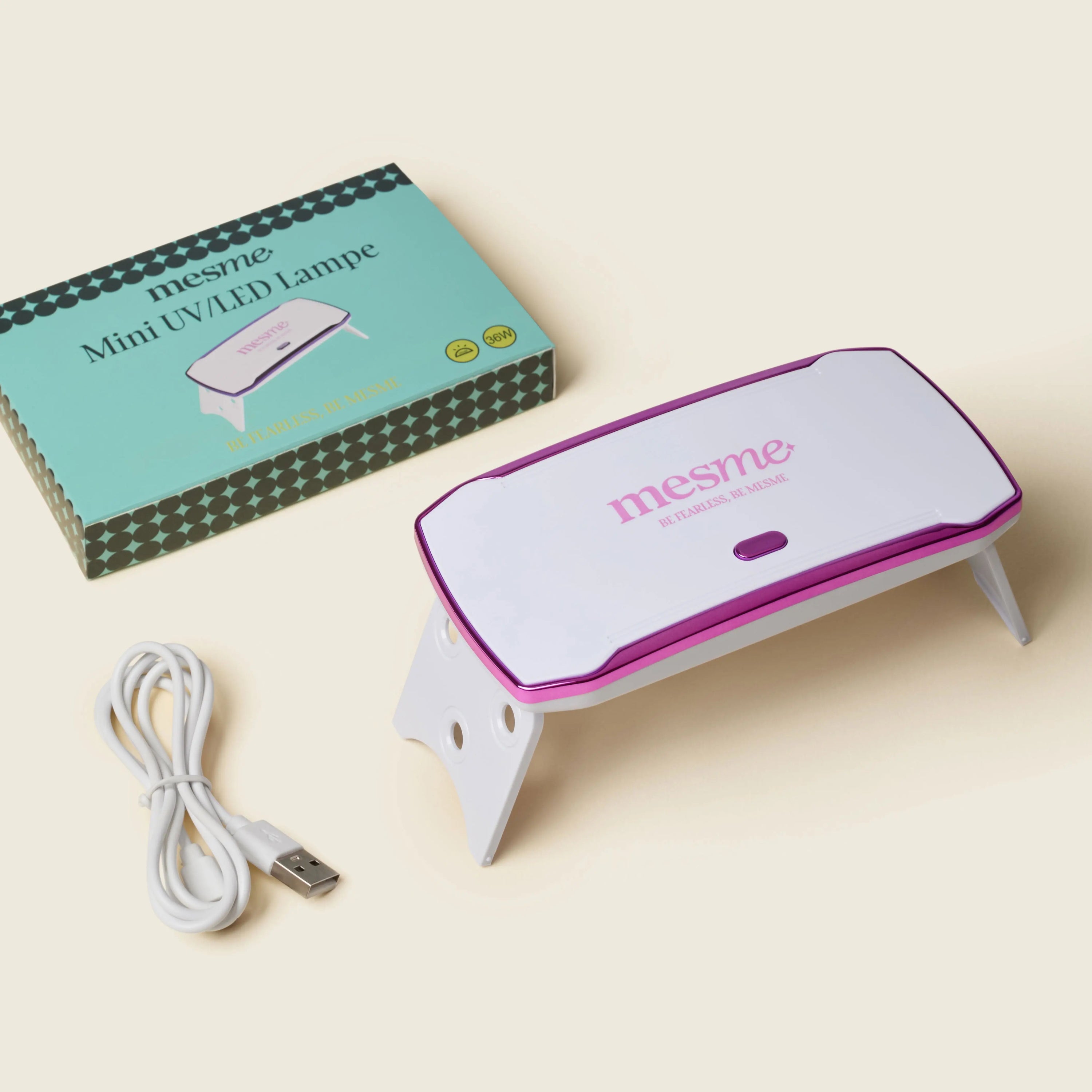 mesme Mini UV/LED Lamp (36W) — for 14-day UV gel wraps — lamp with USB cable and pouch flat lay