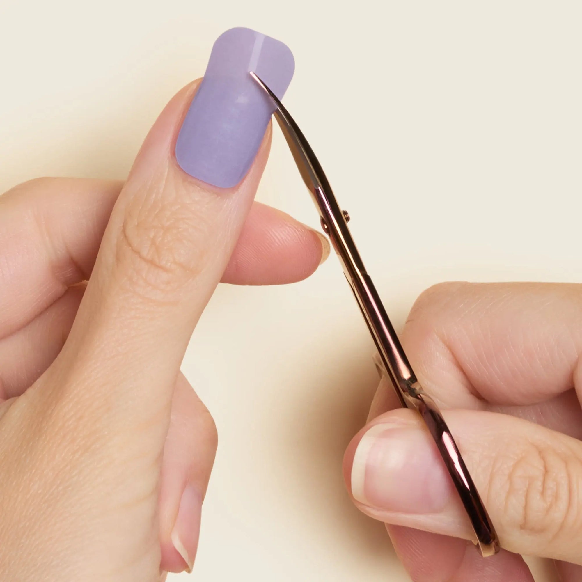 mesme Nail Scissors — for all wraps — trimming excess wrap at the nail tip (in use)