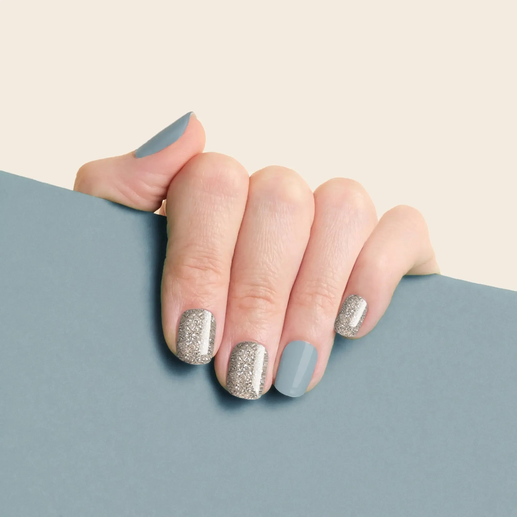 mesme Sophie Blue & Silver 3+ Day UV-Free Gel Nail Wraps On Hand
