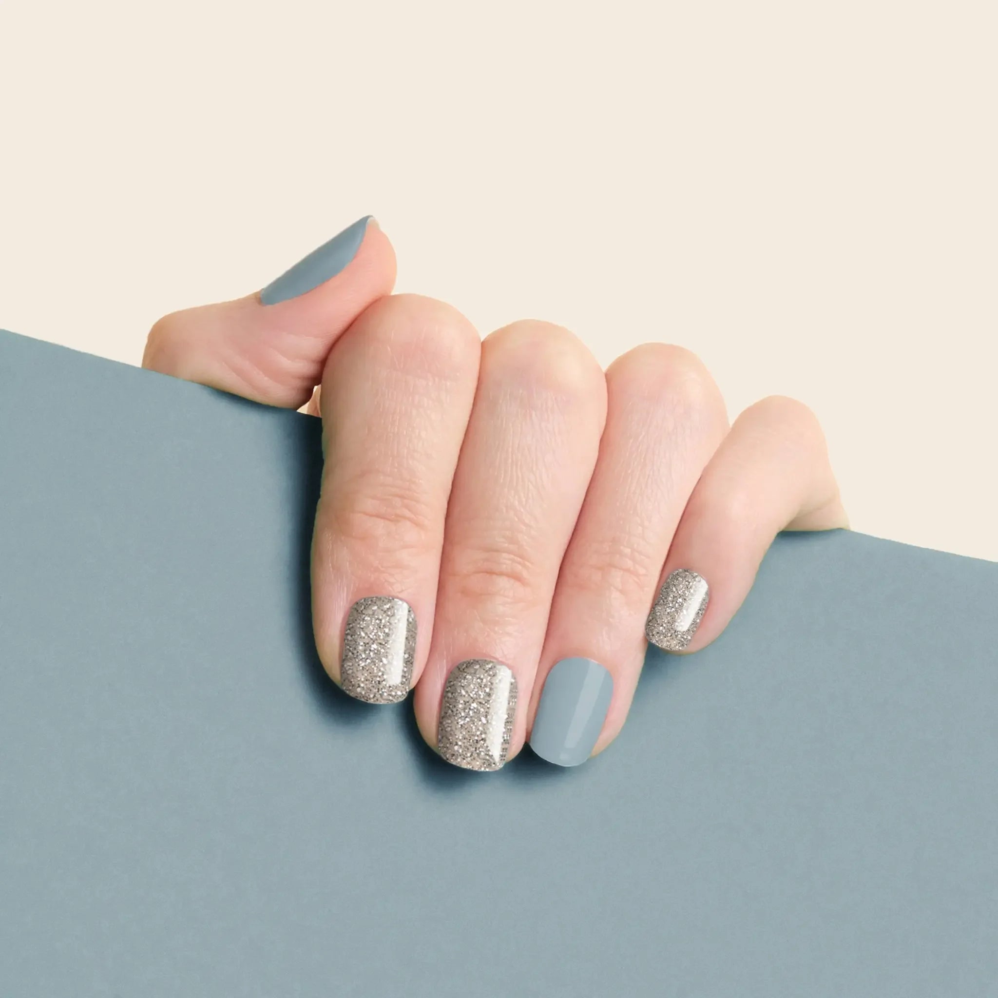 mesme Sophie Blue & Silver 3+ Day UV-Free Gel Nail Wraps On Hand