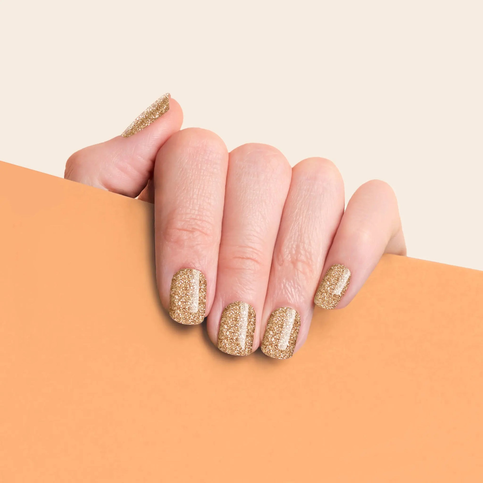 mesme Therese Gold Glitter 10-Day UV-Free Nail Wraps On Hand